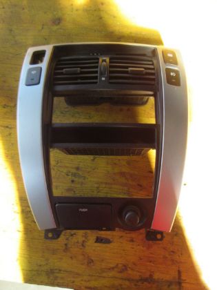 Picture of VERKLEIDUNG MITTE inkl. LUFTDÜSEN SCHALTER HECKSCHEIBENHEIZUNG NEBELSCHEINWERFER, HYUNDAI TUCSON 2,0 (JM)